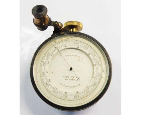 An old English made annodised brass cased compensated aneroid barometer with dial marked for Paul Weiss, Denver and swivel vi