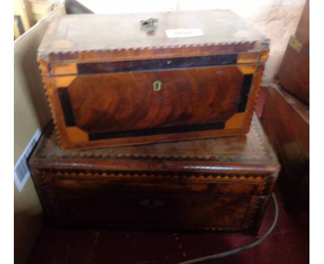 An early 19th Century flame mahogany and strung tea caddy with decorative inlay - sold with a 19th Century walnut veneered an