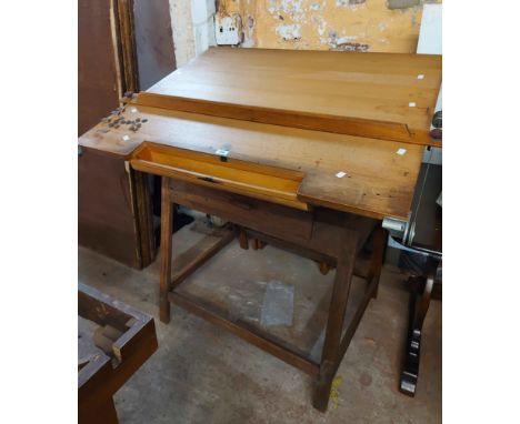 A 1.1m vintage architect's drawing desk with painted metal supports, set on an associated oak table base with frieze drawers 