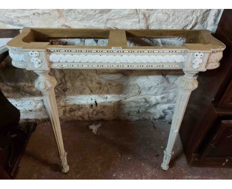 A 97cm white painted wood console table with white marble top (one corner a/f), set on turned and fluted legs