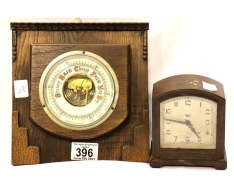 Bakelite clock and an oak cased barometer. Not available for in-house P&amp;P, contact Paul O'Hea at Mailboxes on 01925 65913