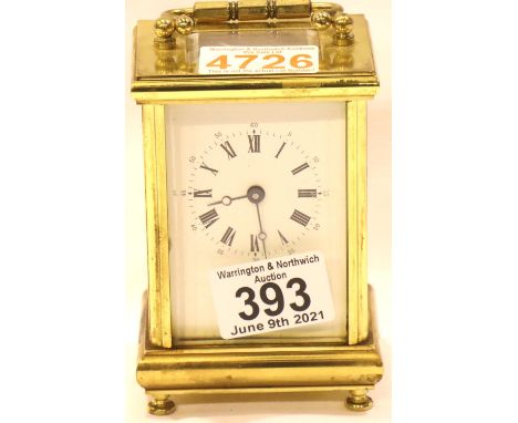 Postilion 20th century lacquered brass carriage clock with five bevelled glass display panels, the dial with roman chapters. 