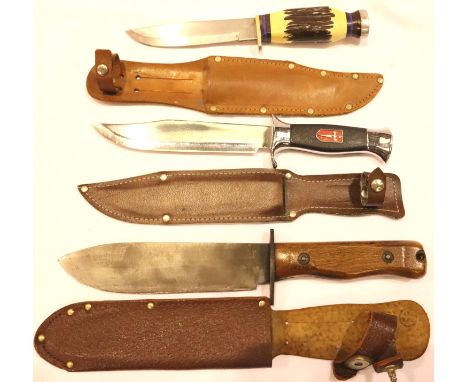 Three hunting knives including a Nowill example. P&amp;P Group 3 (£25+VAT for the first lot and £5+VAT for subsequent lots). 