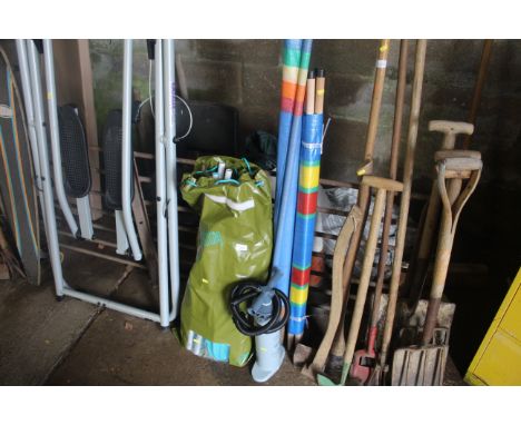 An inflatable dinghy and a quantity of two piece rowing oars with a manual air pump and two wind breakers 