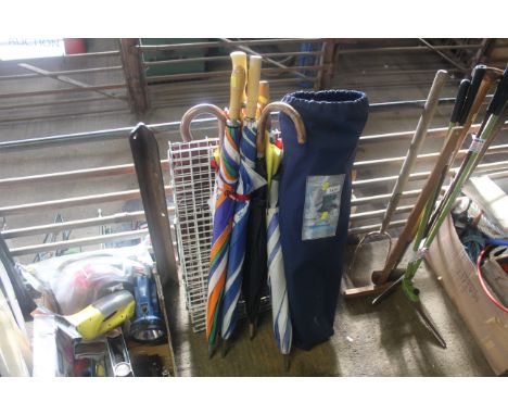 A Hi-Gear compact camp armchair in carry bag, a quantity of various umbrellas and a folding metal pet cage 