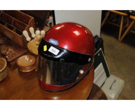 A Shoei motorcycle helmet by Barry Ditchburn and Mick Grant (sold as a collectors item and not to be worn whilst motorcycling