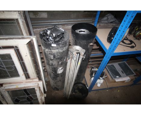 Three various telescopic tripod stands in two hard carry cases