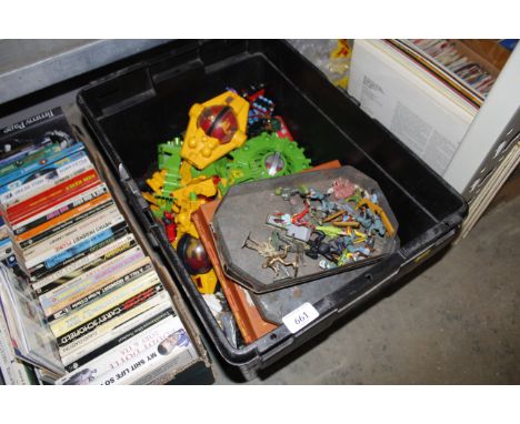 A box containing vintage Britains toy soldiers, Britains space toys and others