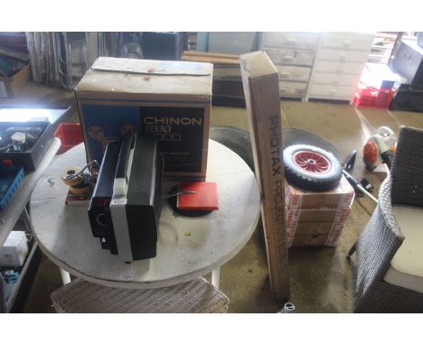 A Chinon Sound 8000 8mm projector in original box and accessories and a Phtotax projector screen in original box 