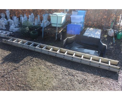 A Youngman aluminium double extending ladder (Four metres when closed)