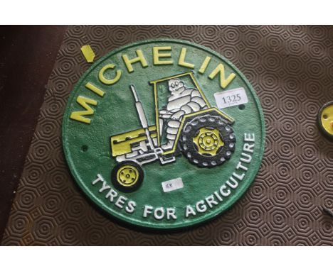 A circular "Michelin on Tractor" sign (163)