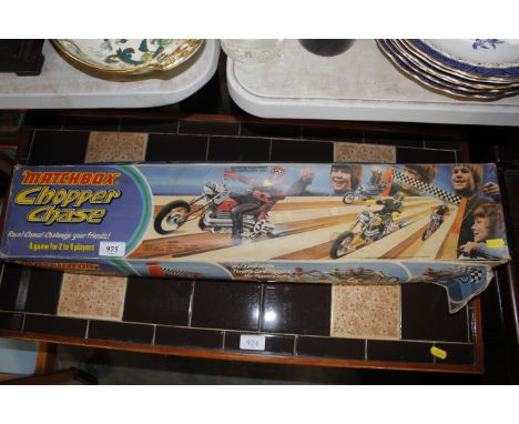 A Matchbox chopper chase game sold as a collectors item (Unknown if complete)