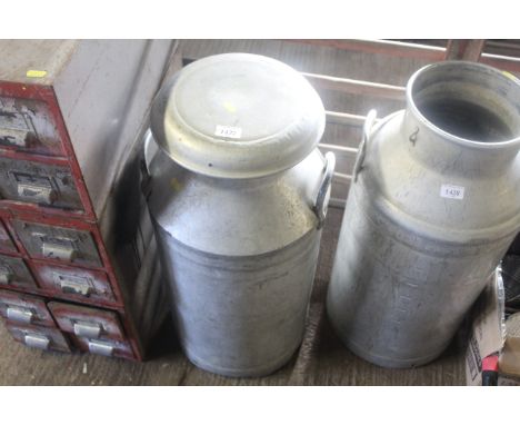 An aluminium twin handled milk churn with lid 
