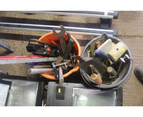 Two plastic builders buckets and contents of tools to include a Stanley smoothing plane, large spanner, spirit level, builder