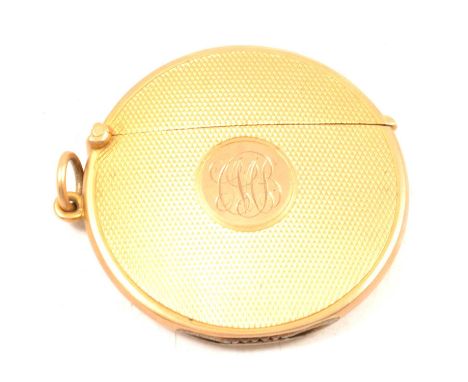 9ct gold vesta case, indistinct makers mark, Chester 1912, circular with engine turned decoration and engraved monogram, 4.5c