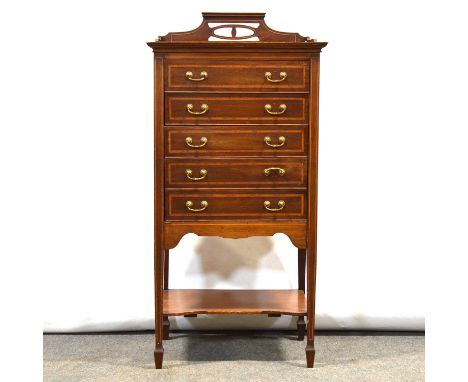 Edwardian inlaid mahogany music cabinet, the top with three-quarter gallery, five flap-front drawers, square tapering legs jo