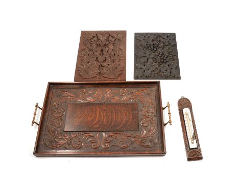 Thomas Birch of Leicester: a carved oak panel with birds and dolphins, 61 x 38cm; two other carved panels; pair of profile po