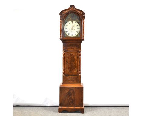 Mahogany longcase clock, the hood with scrolled pediment and applied carved frieze, turned and carved supports, trunk with sh