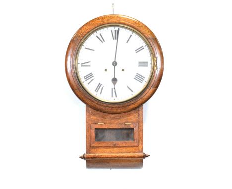 An oak cased wall clock, white circular enamel dial with Roman numerals, glazed short door, 63cm.Condition report:Dial appear