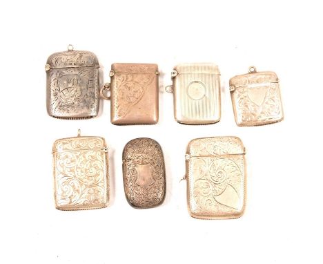 Seven silver vesta cases, all early 20th Century, engraved and engine turned decoration, various dates and makers.Qty: 7