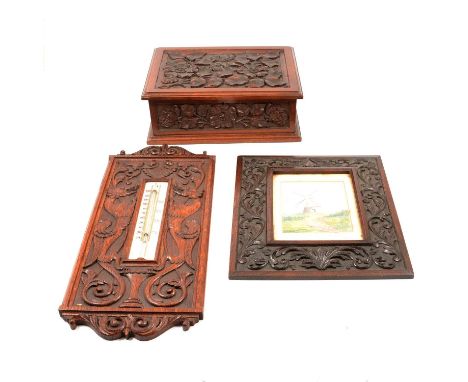 Thomas Birch of Leicester: a carved mahogany box, oblong shape with floral decoration, width 28cm; carved oak picture frame; 