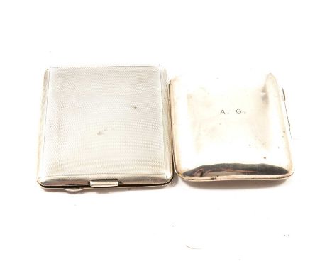 Two silver cigarette cases, one plain, engraved 'AG', the other engine turned, gross weight 6.4toz.