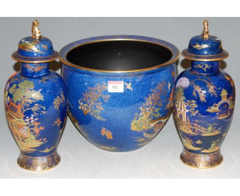 An early 20th century Carlton ware blue lustre jardiniere typically decorated with Chinese pagoda scenes, printed mark verso,