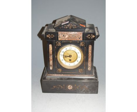 A late Victorian black slate mantel clock, having enamelled chapter ring with Arabic numerals, h.33cm