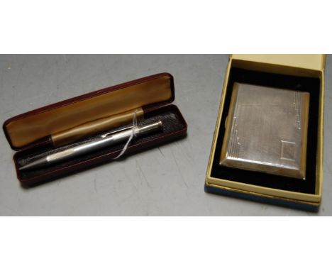 A George V silver engine turned pocket cigarette case by Joseph Gloster Ltd, boxed, together with a silver engine turned prop