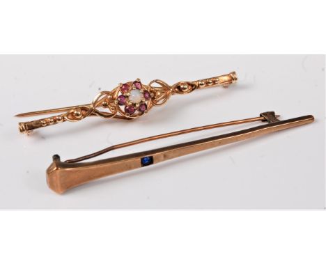 A 9ct opal and ruby cluster bar brooch, hallmarked London 1979, 5.7cm long, and a sapphire bar brooch (unmarked), (7.1g), (2)