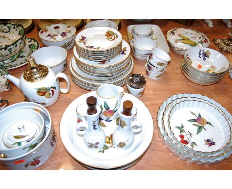 A collection of assorted Royal Worcester oven-to-table wares in the Evesham pattern, to include flan dishes, cruets, tureens 