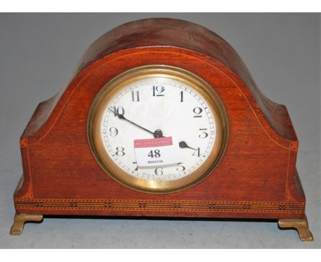 An Edwardian mahogany and chequer strung mantel clock, having enamelled dial with Arabic numerals