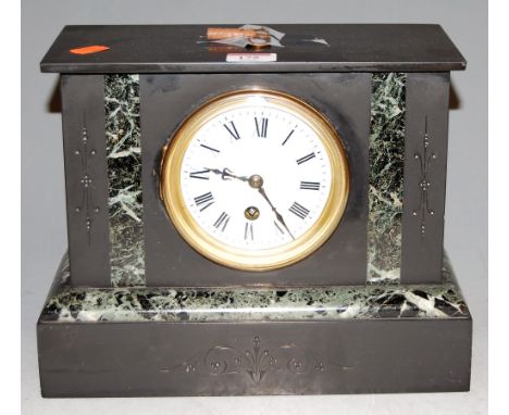A circa 1900 black slate and marble mantel clock having an enamelled dial with Roman numerals and 30 hour movement, width 28c