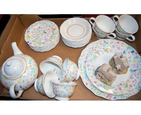A Portmeirion 6-place setting tea service together with two Liliput Lane Cottage ornaments