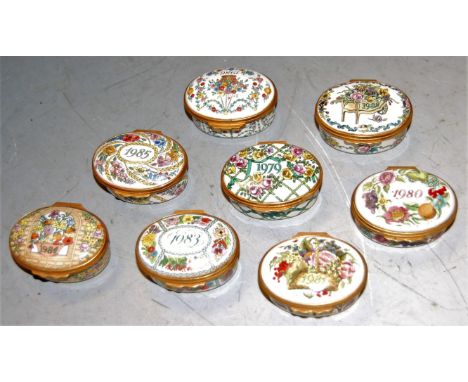 Eight various Halcyon Days enamel trinket boxes from 1979-1986