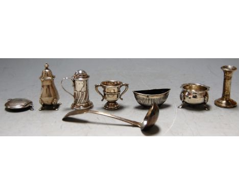 A small collection of assorted silver wares to include Georgian style open salt, small Scottish silver ladle etc