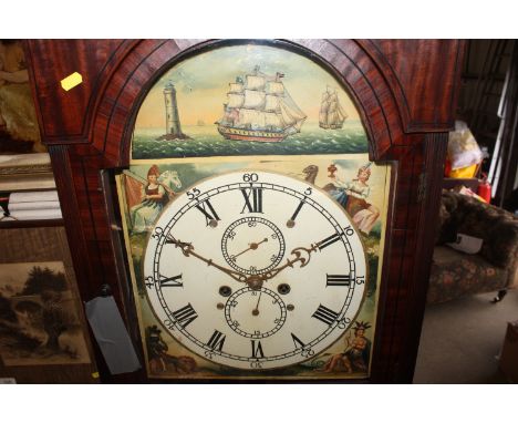 A late George III mahogany and strung long cased clock with swan neck pediment, the trunk with full length door on plinth bas