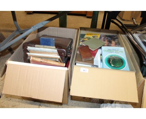 Two boxes containing various books and a vintage case