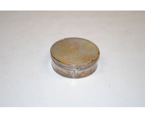 A white metal and mother of pearl circular snuff box with related paperwork