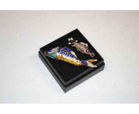 Two vintage enamel decorated articulated fish