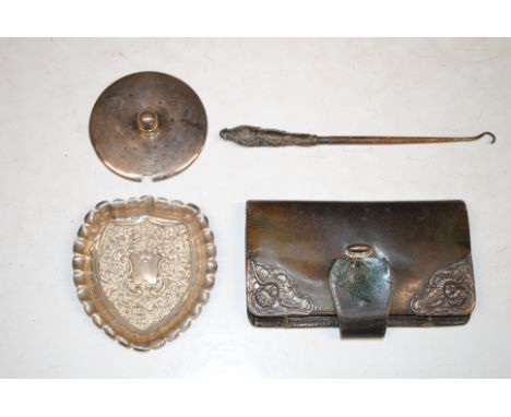 Two silver dishes and a silver lid 67gm; a silver handled button hook and a silver mounted purse