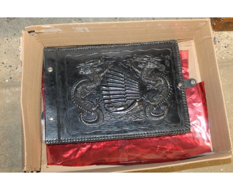 A vintage black photo album, embossed with Chinese dragon and junk, unused all with coloured Glassine paper