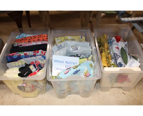 Three boxes containing vintage curtain fabric