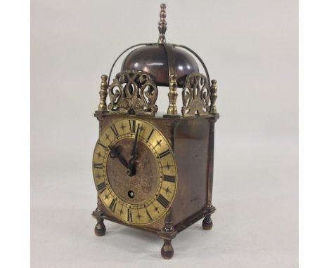 A brass cased Smiths lantern clock, 25cm tall