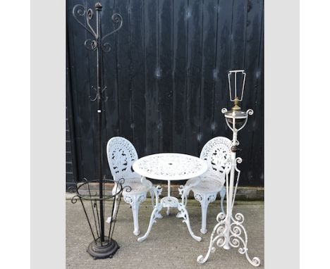 A white painted garden table, 69cm, with two matching chairs, together with a white painted standard lamp and a black painted