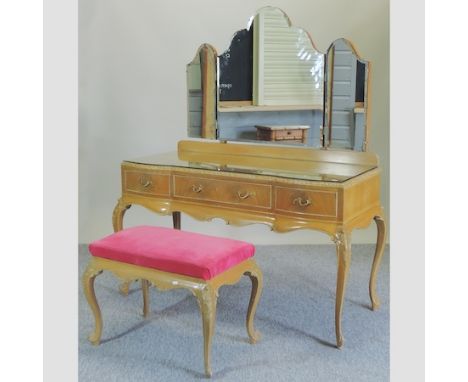 A vintage walnut dressing table, 135cm, together with a matching stool 