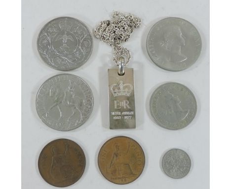 A small collection of commemorative and other coins, together with a silver ingot on chain 