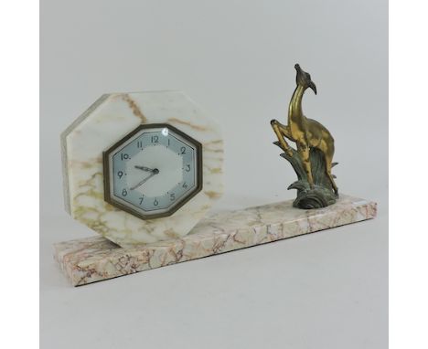 A 1920's French marble mantel clock, surmounted by a deer, 21cm tall