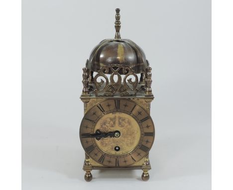 An early 20th century Smiths brass cased lantern clock, 24cm tall