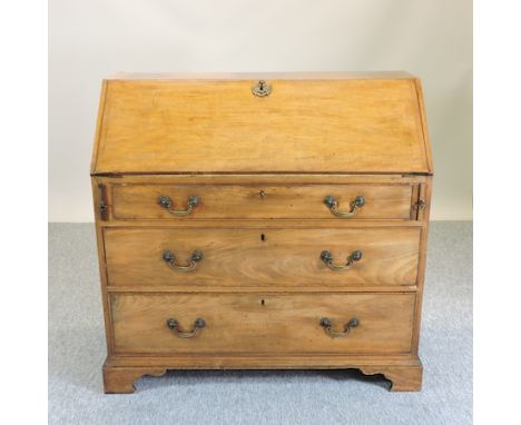 A George III mahogany bureau on bracket feet, 106cm